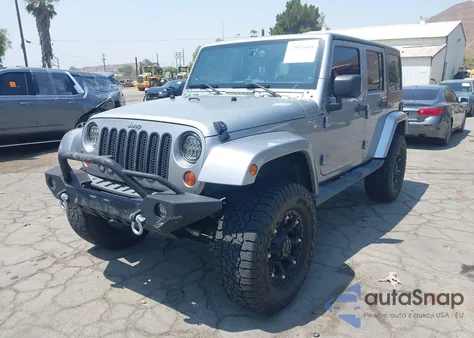 2013 Jeep Wrangler Unlimited Sahara z USA, uszkodzony, nr VIN 1C4BJWEG6DL539208